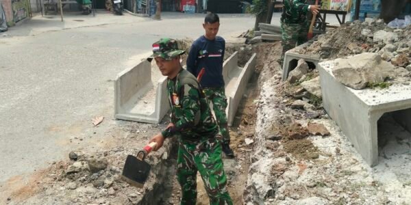 Pentingnya Gali Parit oleh Satgas TMMD untuk Perbaikan Drainase Desa