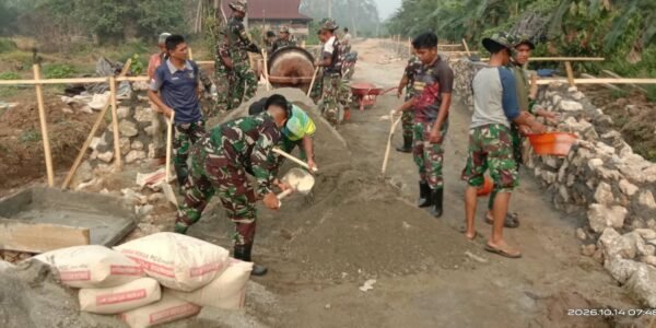Gotong Royong Masyarakat Parumpanai Percepat Proyek Rabat Beton TMMD 2026